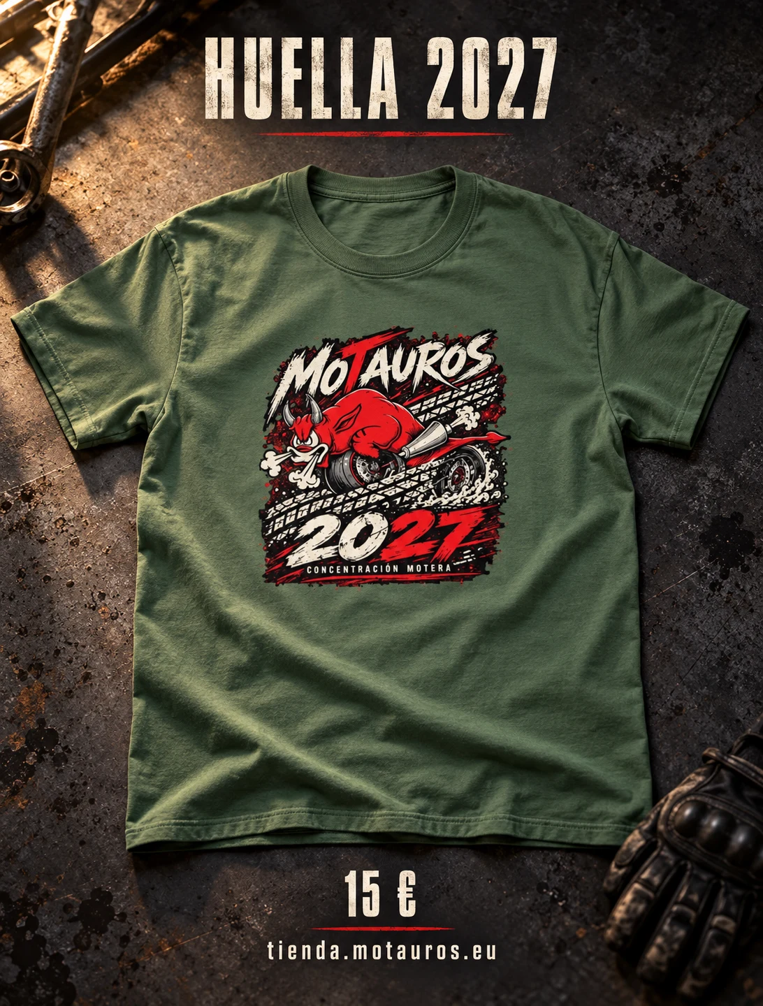 Camiseta Motauros Huella 2027 verde militar con el toro rojo, sobre una mesa de taller